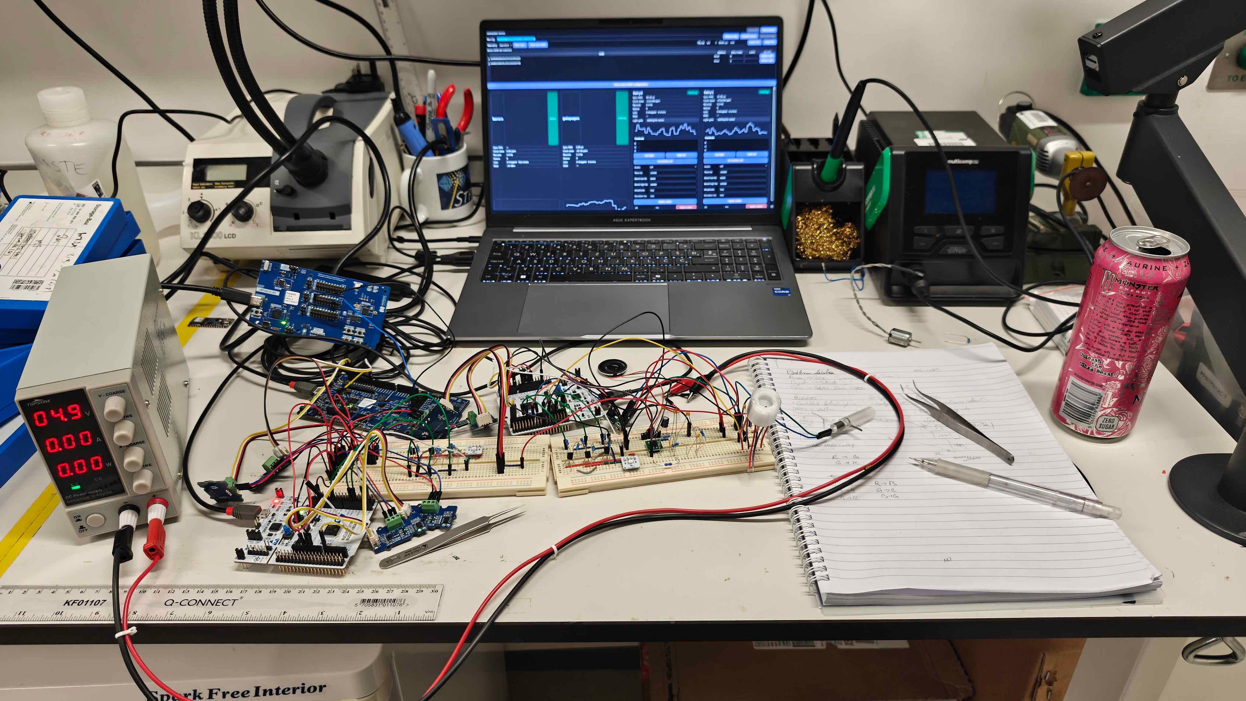 Bench prototype with the Korora hub, Fairy reward-port controllers, Galapagos timing interface and host control software.